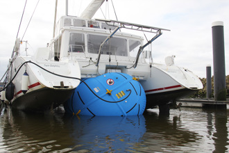 Lifting catamaran in water