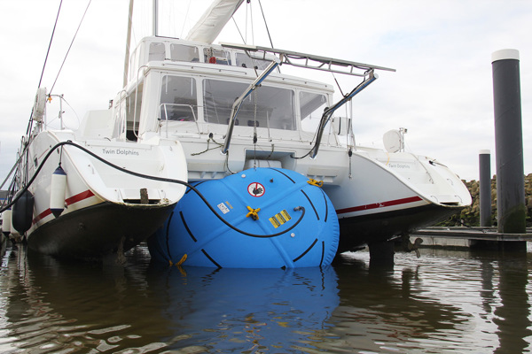 Lifting catamaran in water