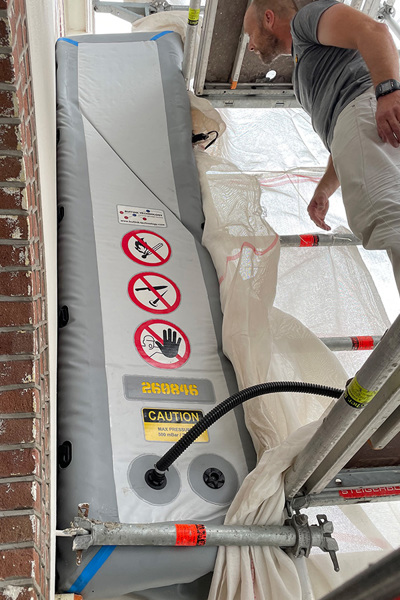 Inflatable facade sealer