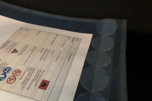 Chemically resistant document holders